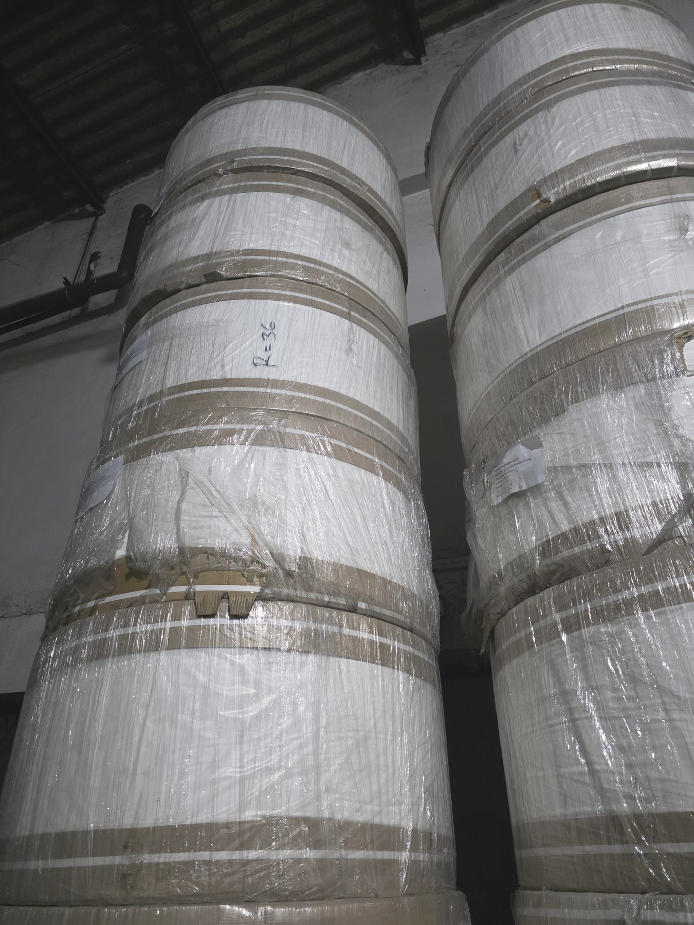 Close view of wrapped imported paper rolls